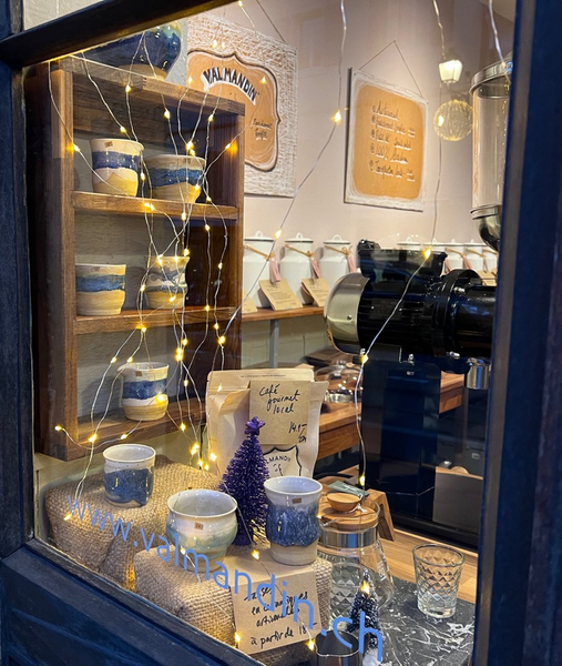 A partial view of the Valmandin Coffee Shop window.